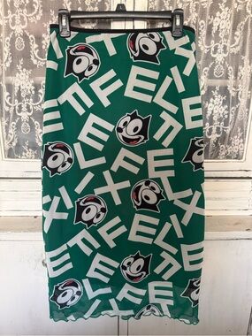 Universal Green Midi Skirt with White Graphic and Black Cartoon Faces